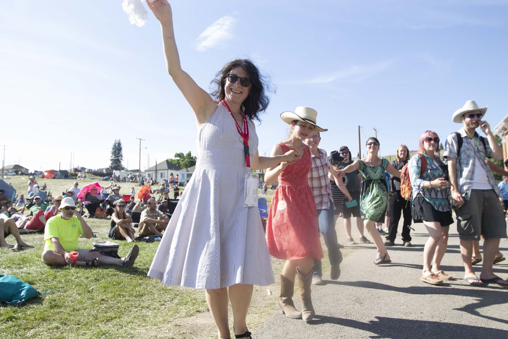 Avia Moore leads audience members on traditional dance